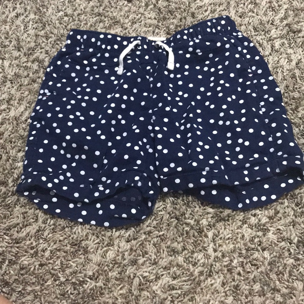 White Polka dots with blue shorts